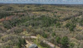 Where Towering Pines, Quiet Trails & Country Dreams Meet — 5.92 Acres Near Tomah