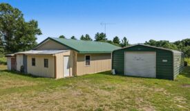 Enjoy country living on this 2.63± acre property just outside Sparta